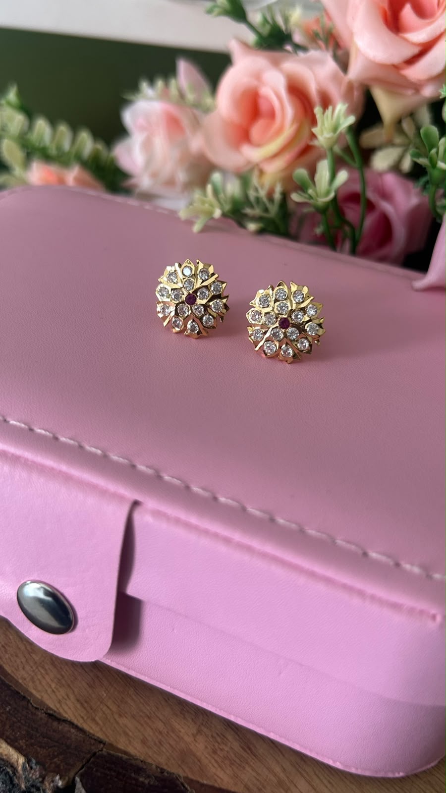 Traditional Panchaloham Gold Finish Floral Stud Earrings with White Stones and Ruby Red Center for Women