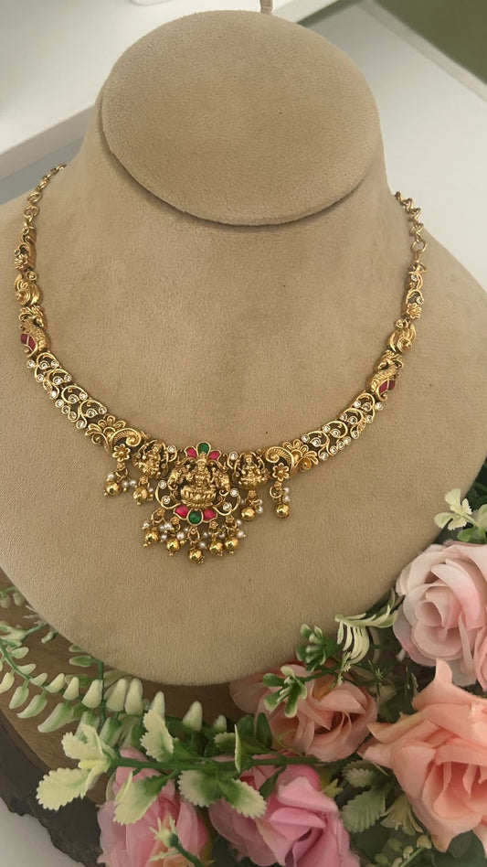 Royal Antique Gold-Tone Lakshmi Devi Temple Jewellery Necklace Set with Ruby Green Stones, Pearl Ghungroo Drops & Matching Jhumka Earrings for Women