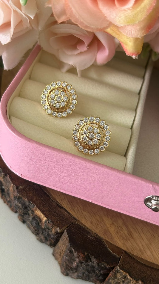 Royal Blossom Panchaloham Gold Polished Circular Floral Stud Earrings with White AD Stones for Women            Is this conversation helpful so far?