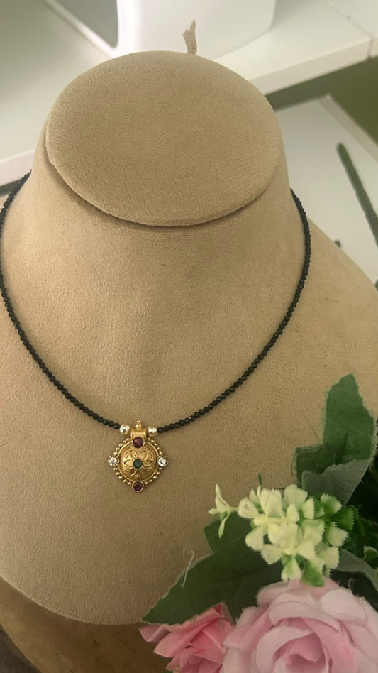 Elegant Invisible Black Beads Mangalsutra with Traditional Panchaloham Floral Dollar Pendant for Women