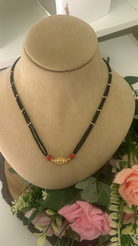 Elegant Double Line Black Beads Mangalsutra with Red Carved Beads & Gold Tone CZ Stone Designer Centerpiece for Women