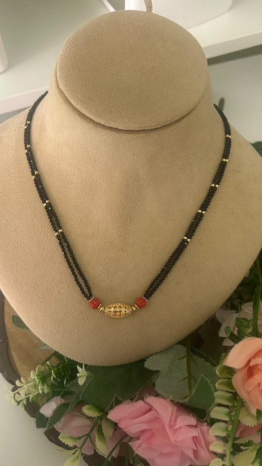 Elegant Double Line Black Beads Mangalsutra with Red Carved Beads & Gold Tone CZ Stone Designer Centerpiece for Women