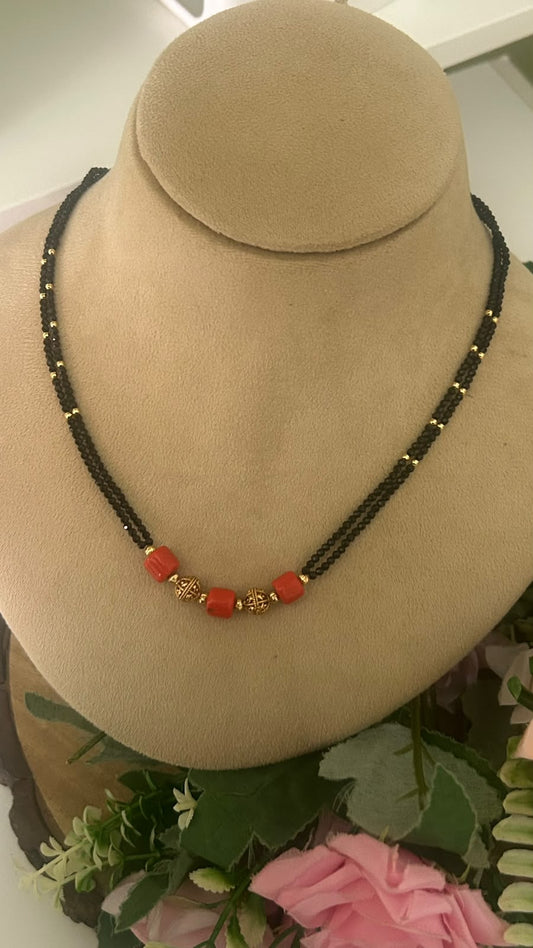 Trendy Double Line Black Beads Mangalsutra with Red Coral Style Beads & Antique Gold Tone Designer Balls for Women