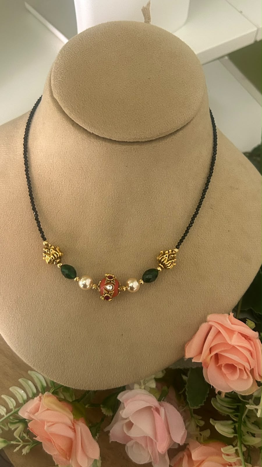Elegant Invisible Black Beads Mangalsutra with Red Enamel Bead, Green Stones, Pearls & Antique Gold Tone Designer Accents for Women