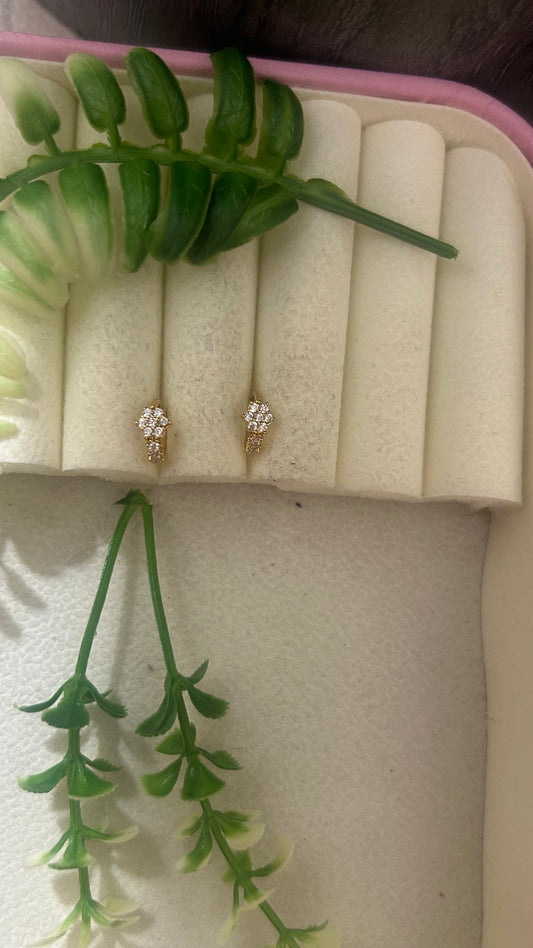 Small CZ flower Bali used as second stud